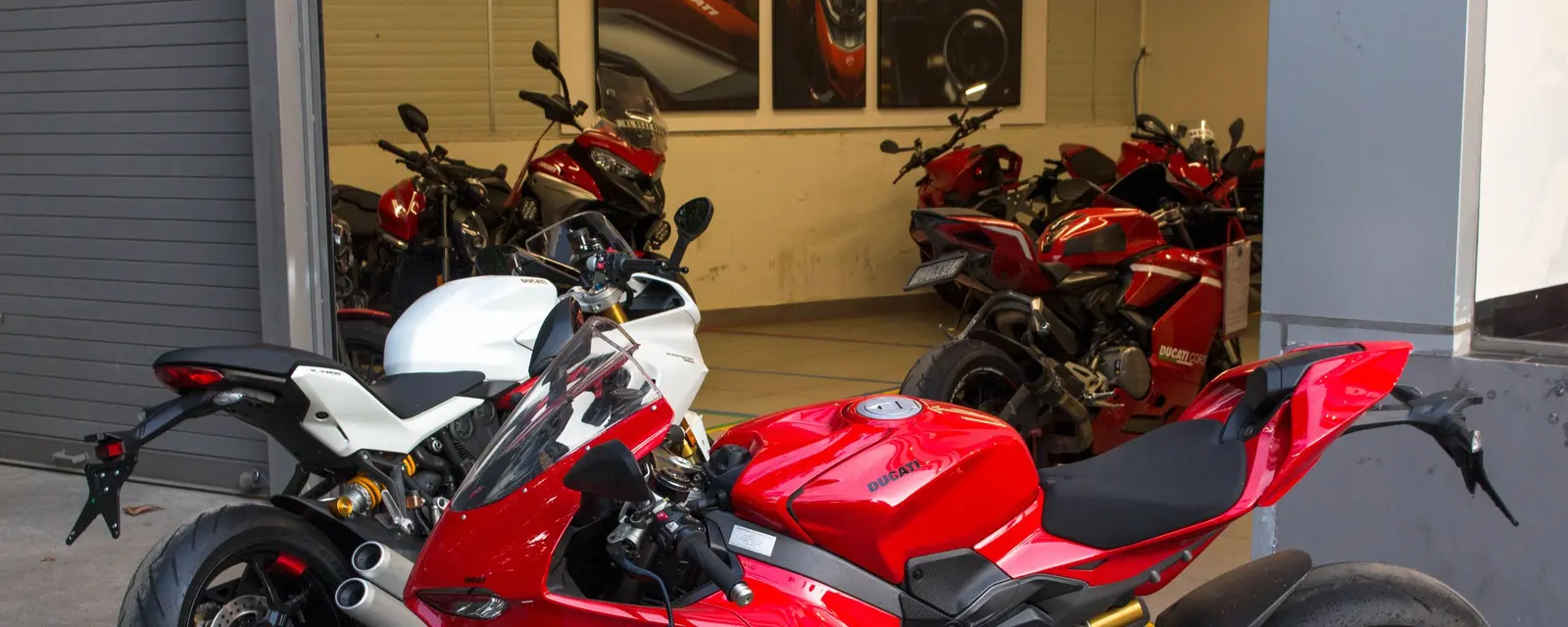 New sport bikes lined up on a showroom floor