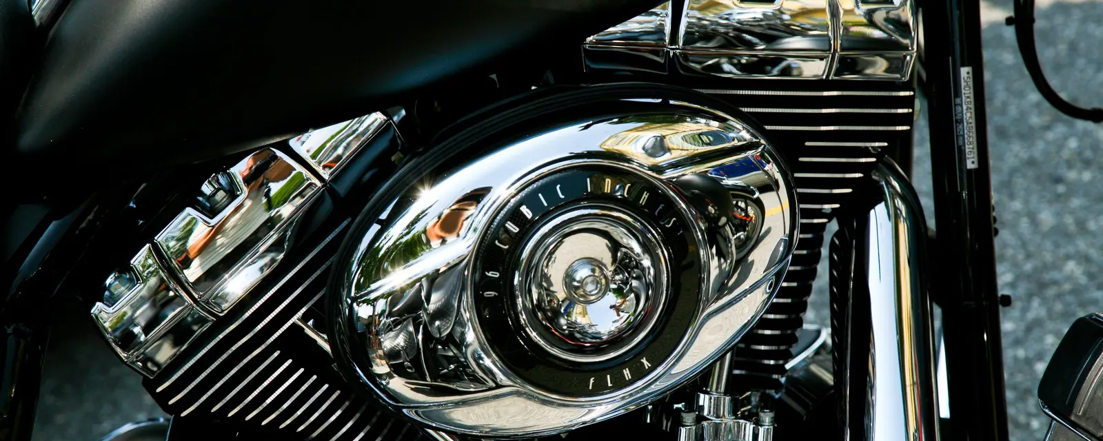 Chrome and finned alloy of a big twin engine in close detail